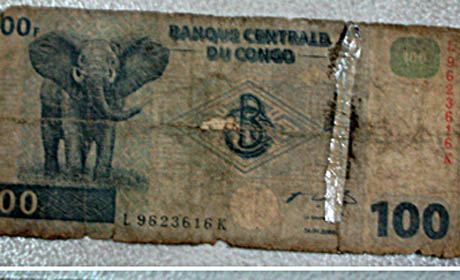billet de 100 FC déchiré